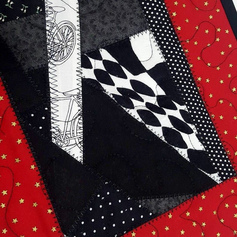 Quilted Patchwork Mug Rug: Red, Black, and Gold Star Print