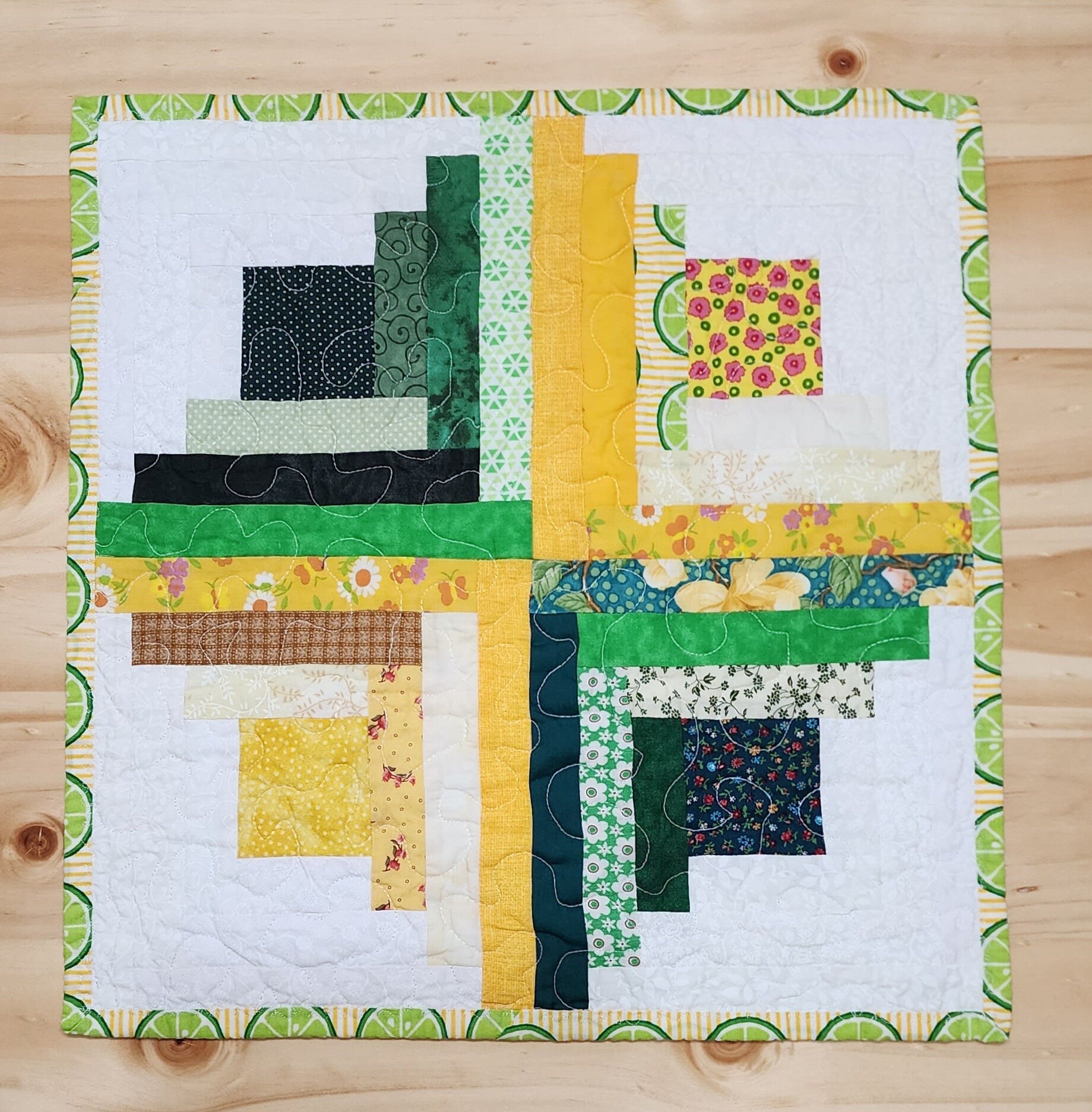 Patchwork Log Cabin Table Topper – 17" Square – Yellow & Green Quilted Mat