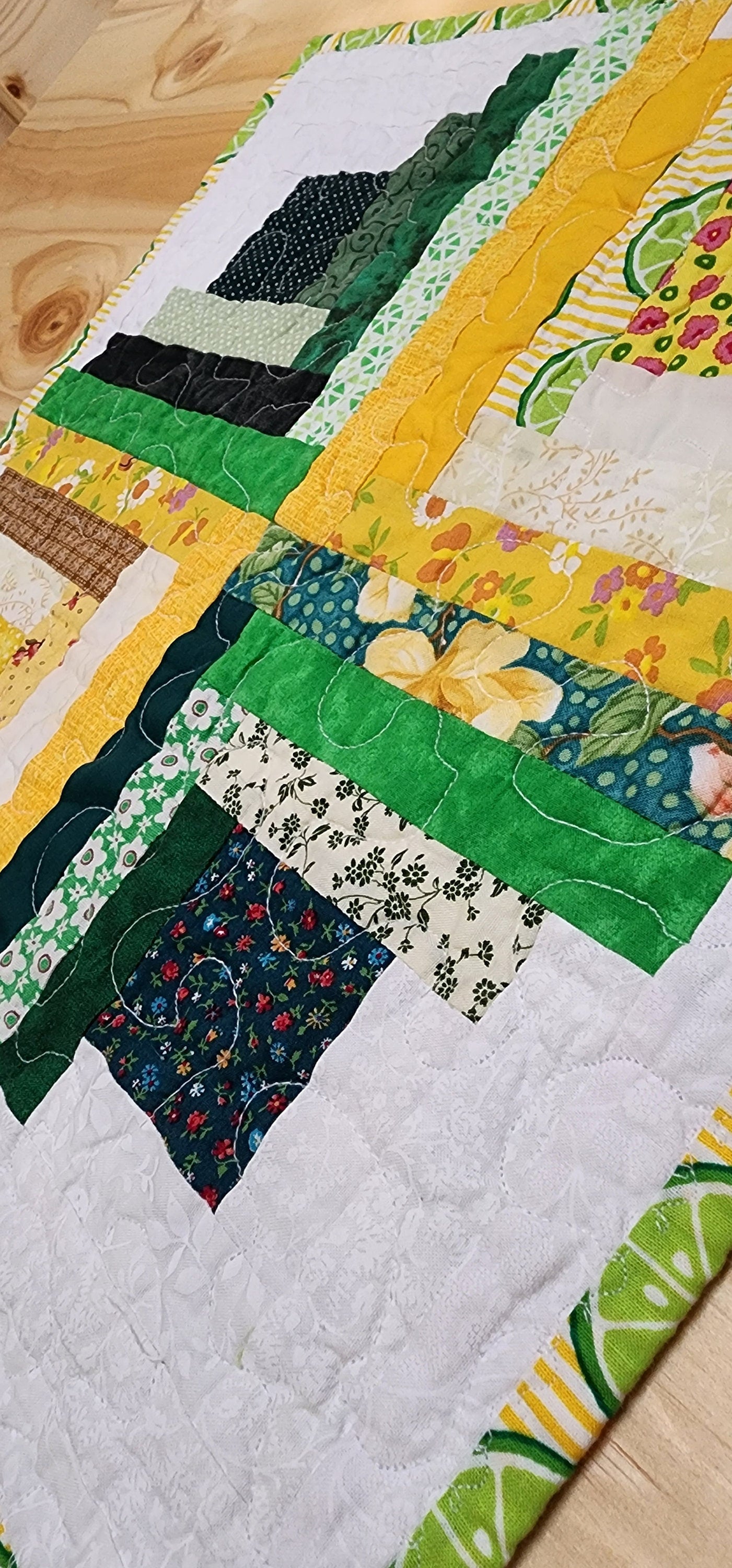 Patchwork Log Cabin Table Topper – 17" Square – Yellow & Green Quilted Mat