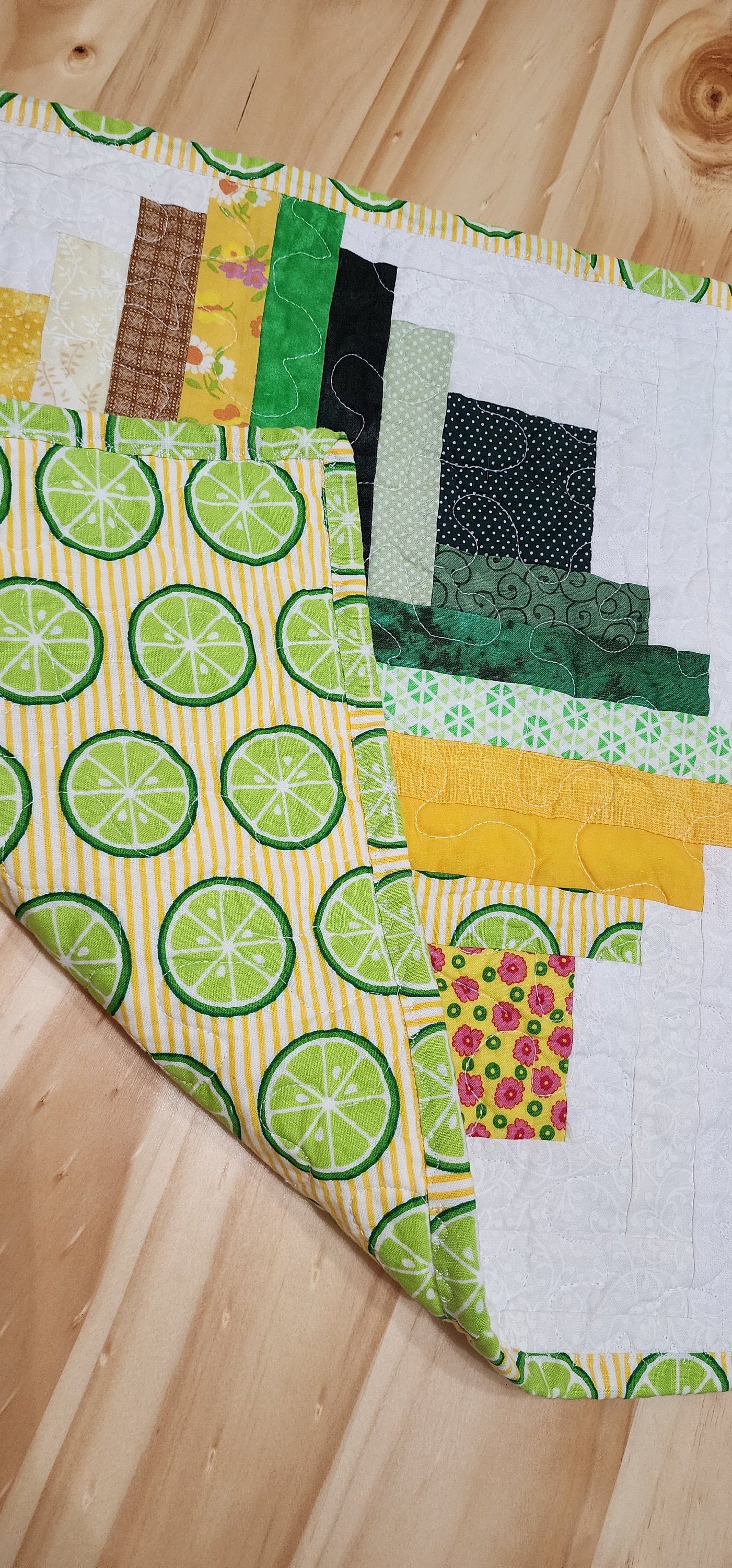 Patchwork Log Cabin Table Topper – 17" Square – Yellow & Green Quilted Mat