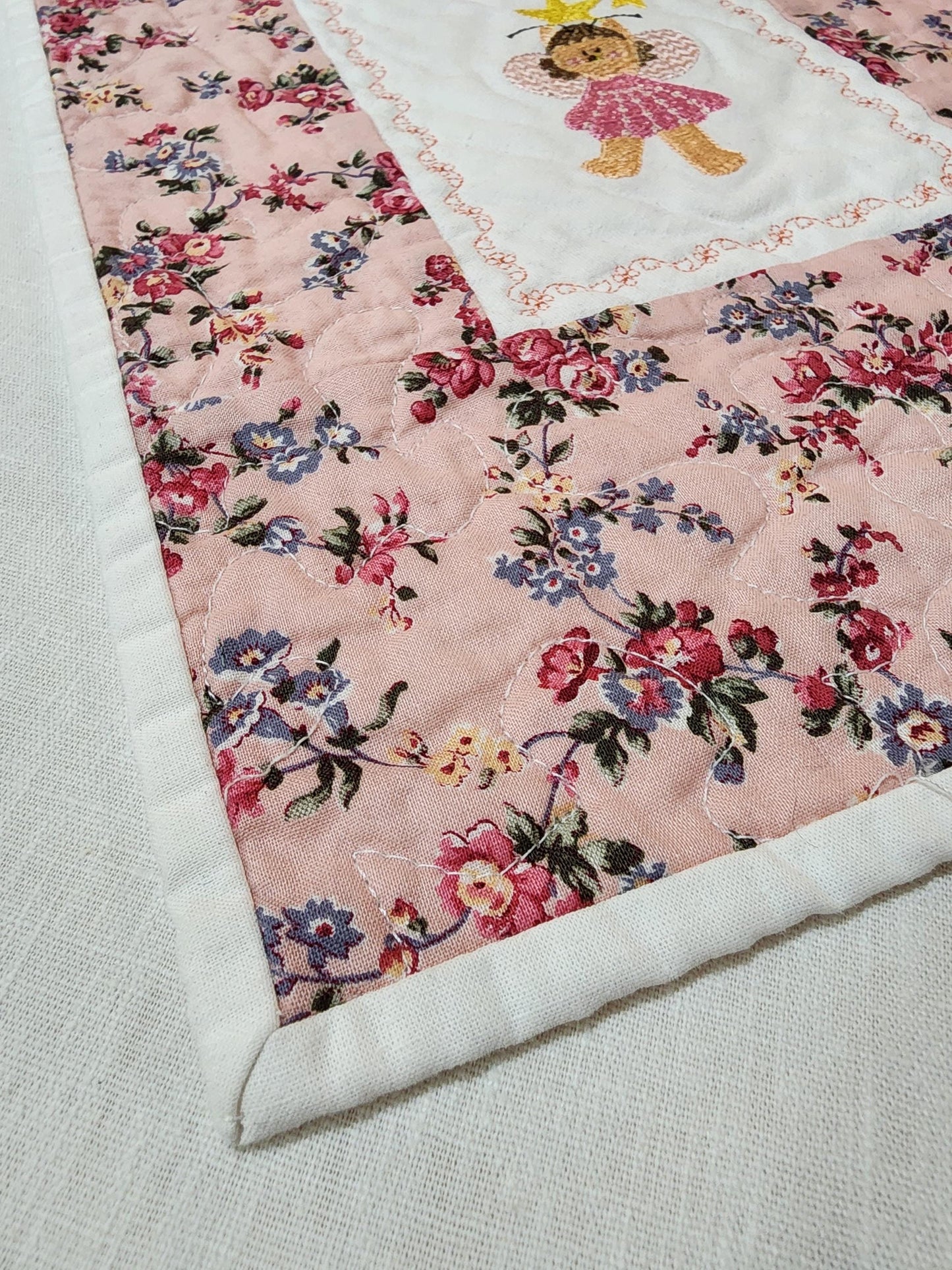 Handmade Mini Doll Quilt – 13.5" x 10" – Floral Patchwork with Embroidered Bear Fairy