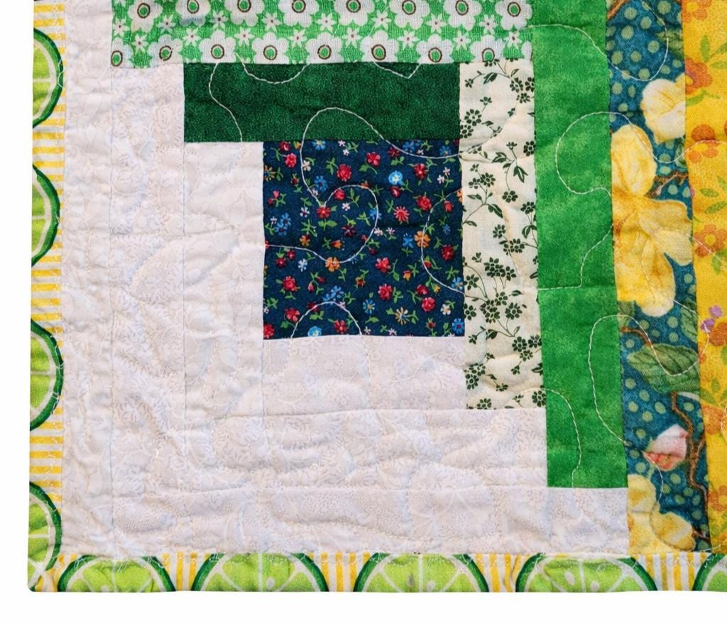 Patchwork Log Cabin Table Topper – 17" Square – Yellow & Green Quilted Mat