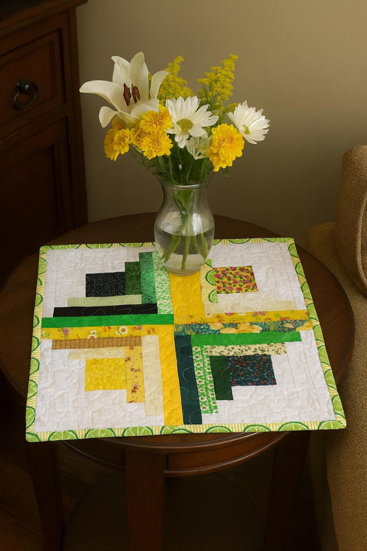 Patchwork Log Cabin Table Topper – 17" Square – Yellow & Green Quilted Mat