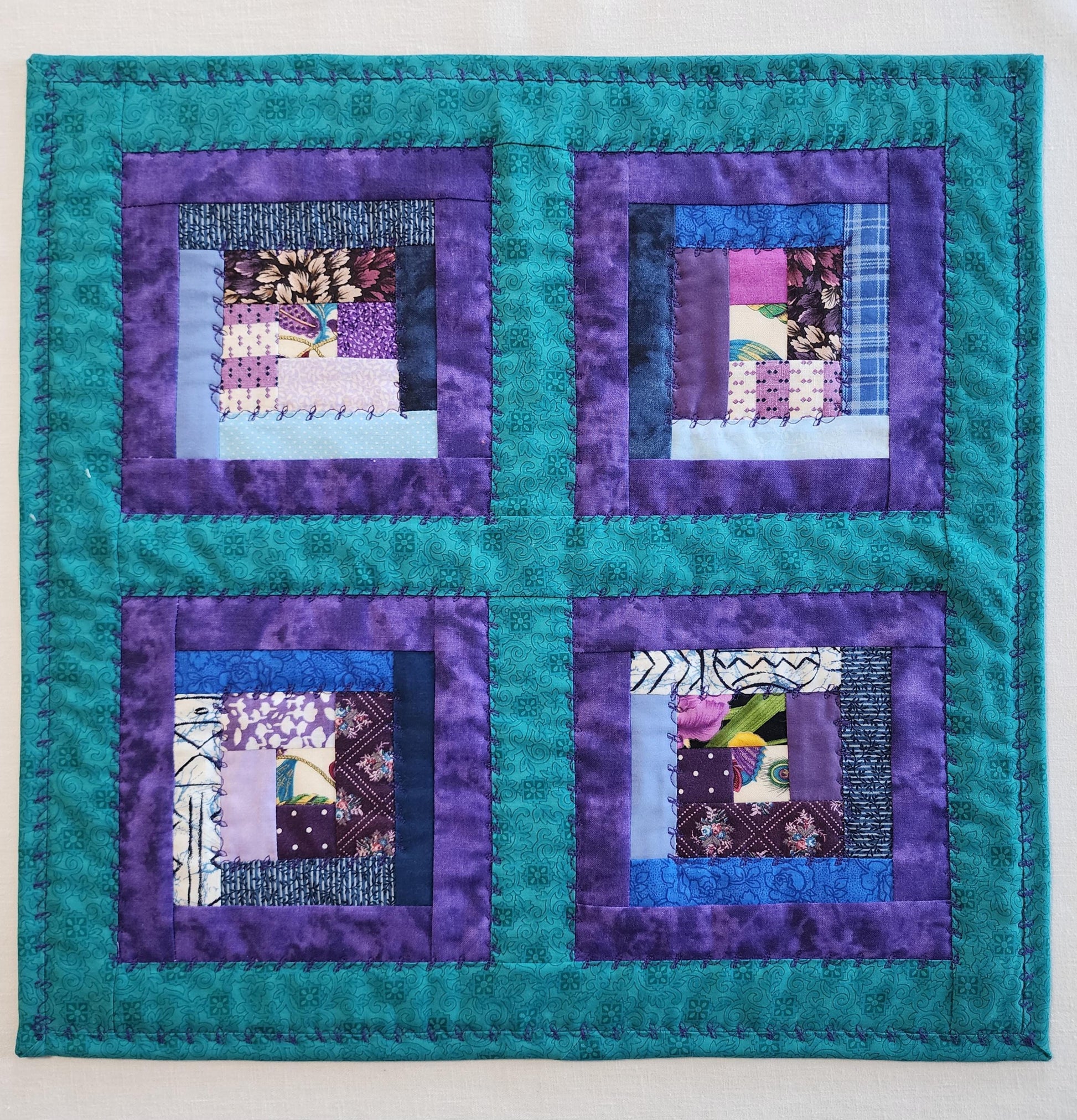 Teal and purple quilted Log cabin table topper