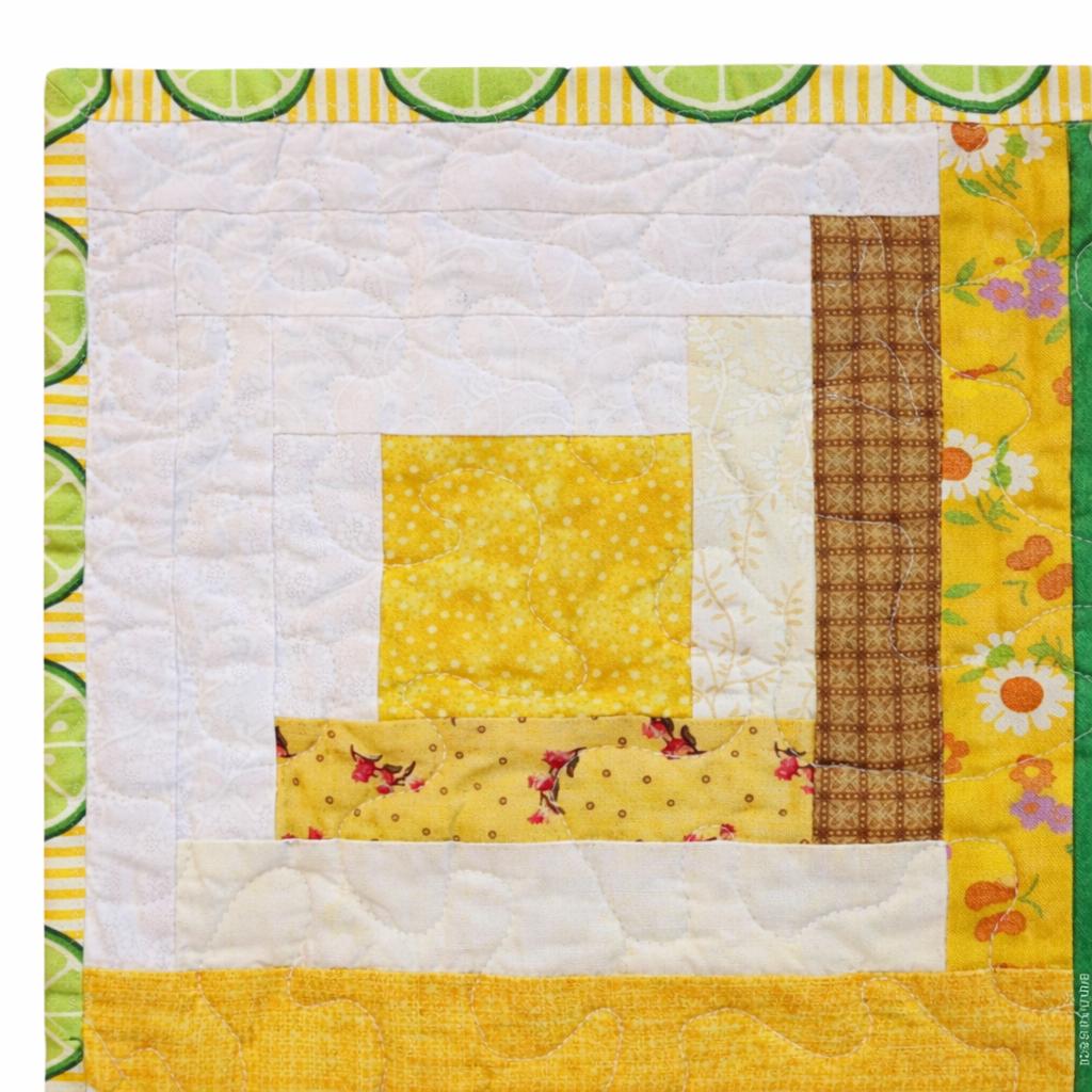 Patchwork Log Cabin Table Topper – 17" Square – Yellow & Green Quilted Mat