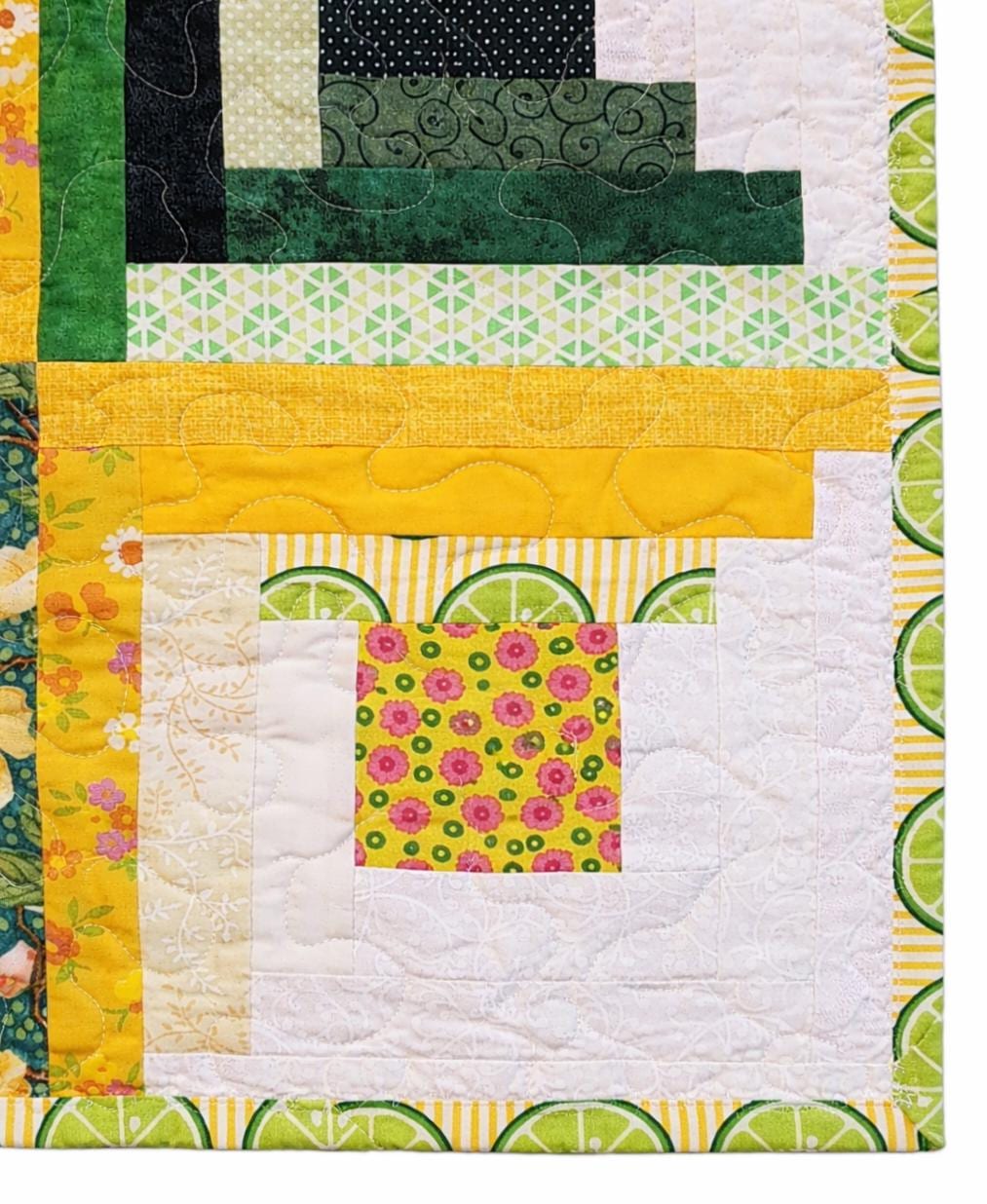 Patchwork Log Cabin Table Topper – 17" Square – Yellow & Green Quilted Mat